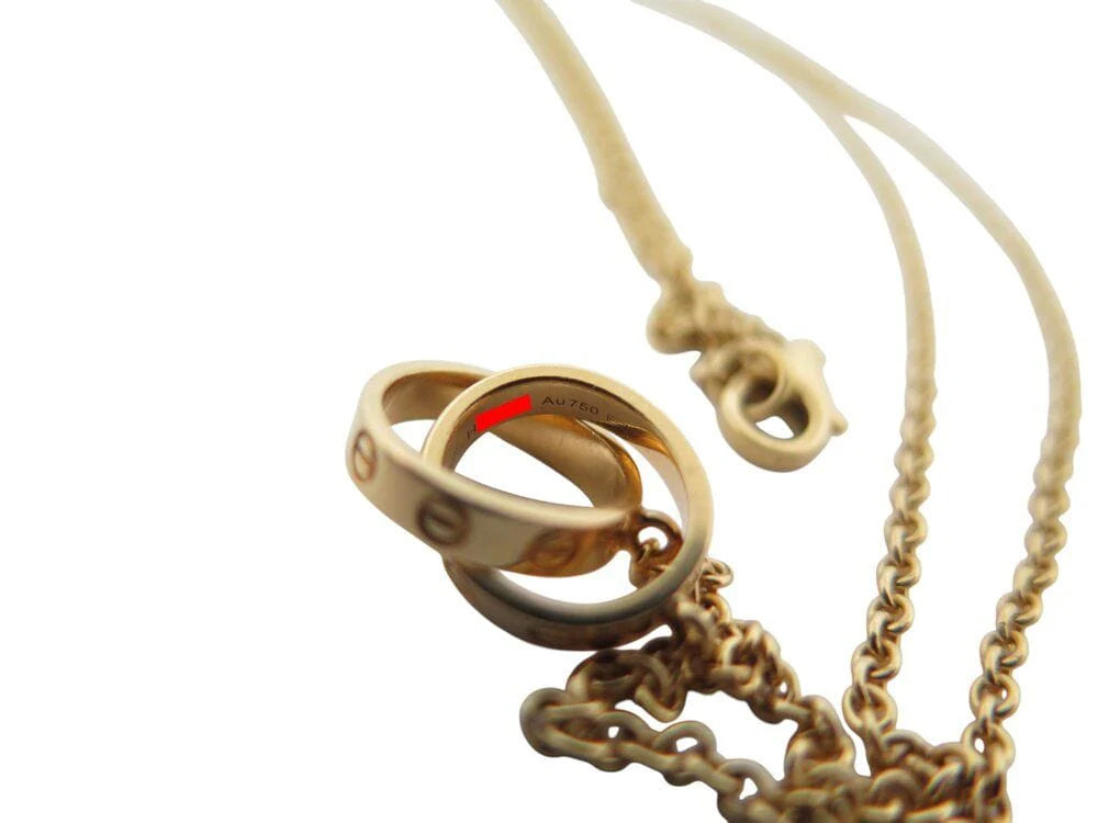 collier cartier double bagues